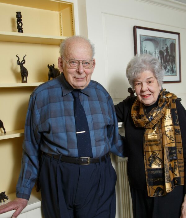 Alfred Viola left Vienna on an April 1939 Kindertransport--shown here with his wife, Joy. His first foster home placement in Leeds was unacceptable to local police, who took him from the home. He was sent to London and soon thereafter evacuated to the countryside in the wake of the blitz. Local farmers came to the town hall and selected the children they would care for. "It was like a meat market" he recalled and he was left, alone, the skinny 9-year-old that no one wanted because he spoke only German. A woman rushed in late, agreed to take him, and he found himself in a wonderful home. His mother got to England on a program for domestic servants. His father made it to New York where the family was reunited.